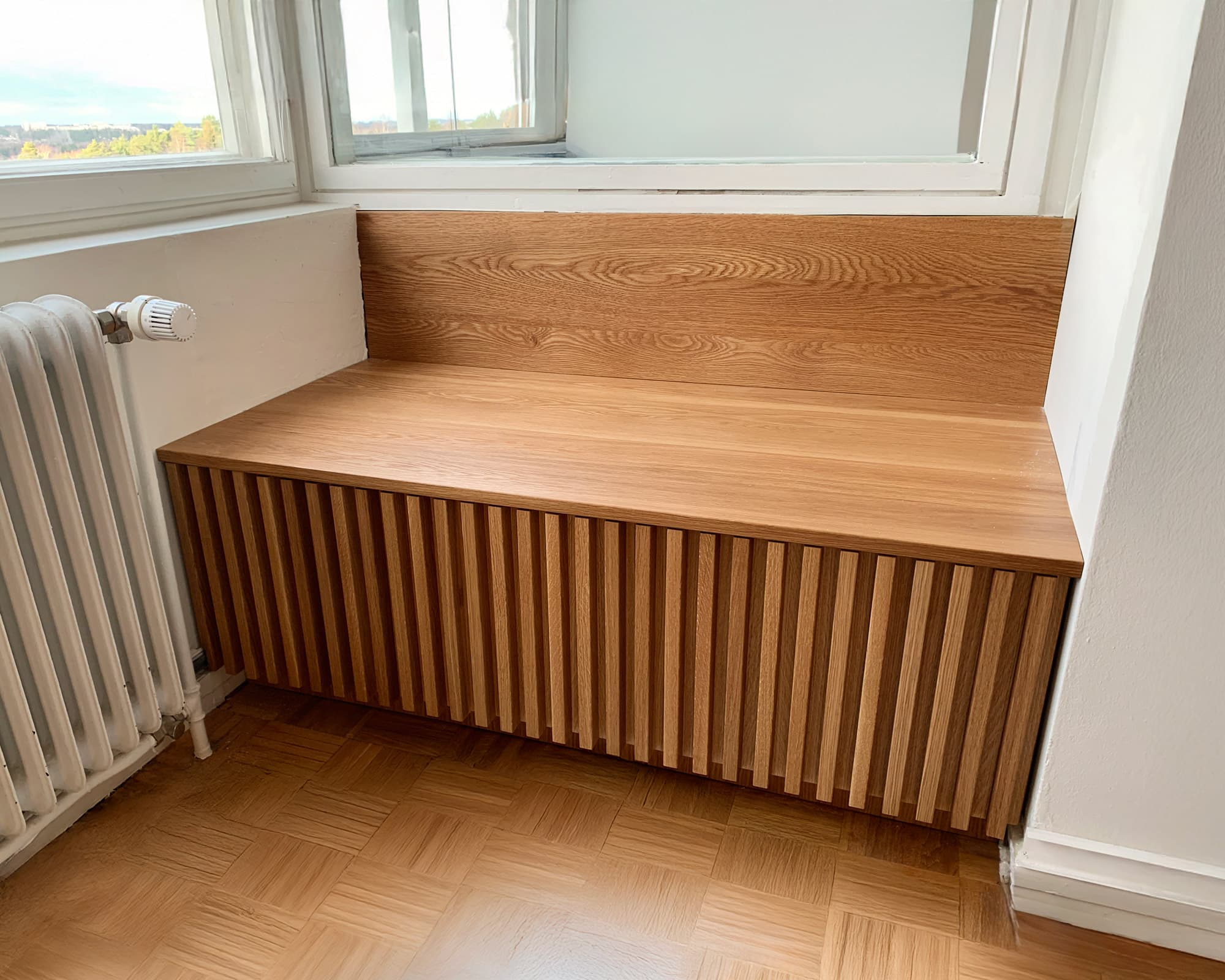 Puuseppä Helsinki: Mittatilauskaapisto lattiasta kattoon, saumattomat ovet ja piilovetimet